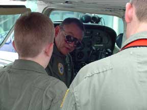 1st Lt Dan King answers cadets questions before beginning the pre-flight inspections